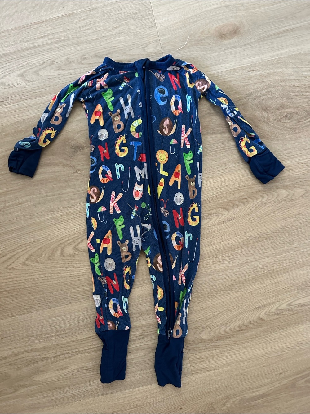 Little Sleepies Navy Alphabet Zip One-Piece Footie